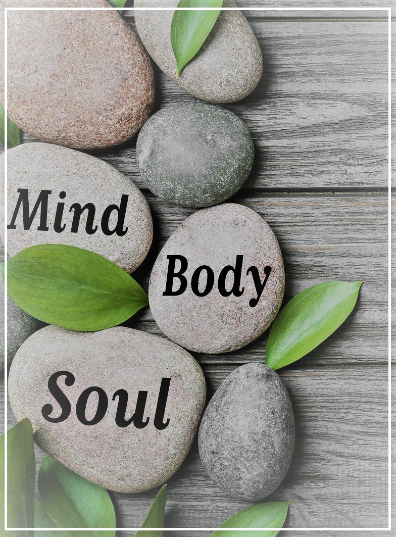 The words "mind, body and soul" on stones to represent Anxiety Treatment - Counseling for anxiety with a Fairfax, VA psychotherapist