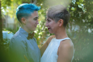 Two women on their wedding day after attending premarital counseling or marriage counseling in Fairfax, VA or Woodbridge, VA at the Center for Connection Healing and Change. Couples therapy in Fairfax, VA and Woodbridge, VA can help you reconnect and feel more connected in your marriage.